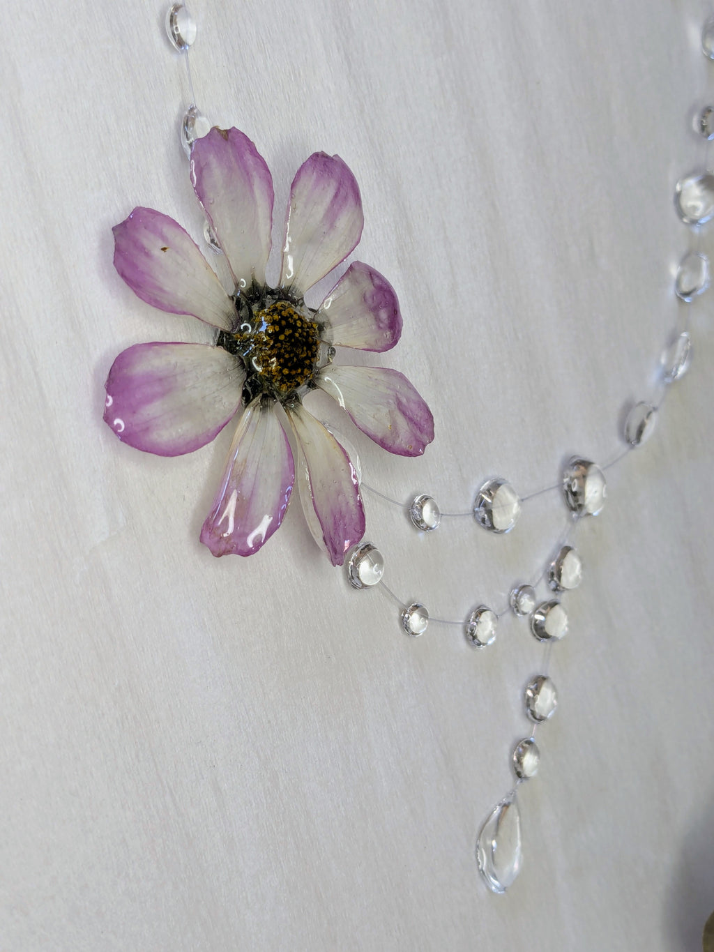Collier Cosmos pluie